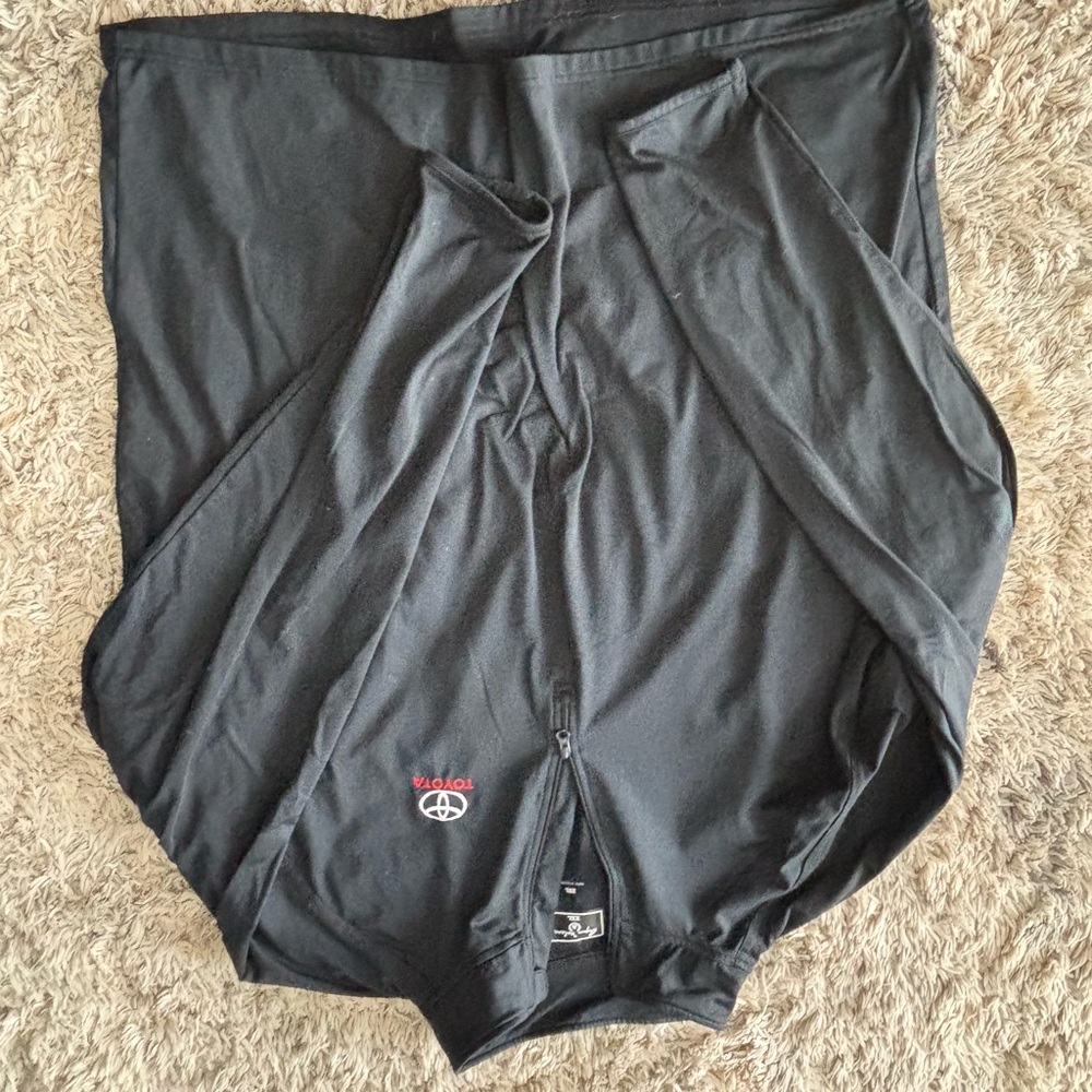 Black quarter length zip up with Toyota Logo
